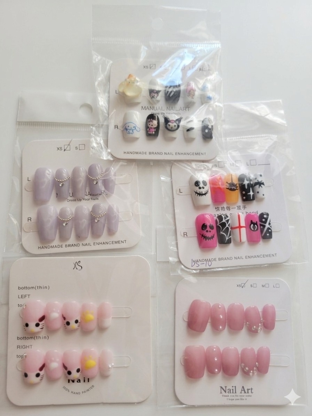 Assorted Womens Press-On Nail Sets — Pink & Lavender Styles includes all 5 xs